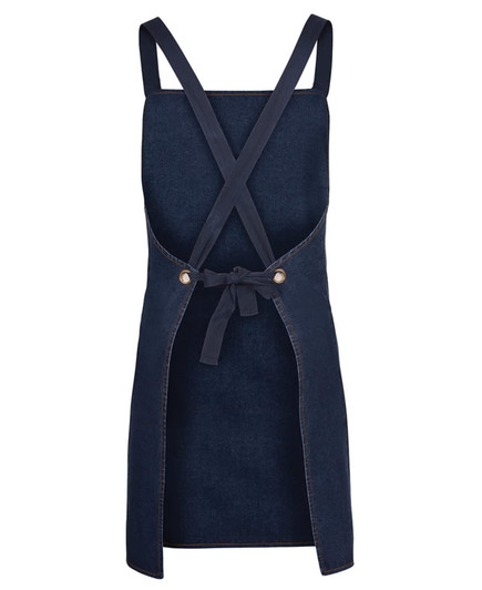 A navy blue cross back denim apron featuring a tied waist and a logo. Suitable for workwear use.
