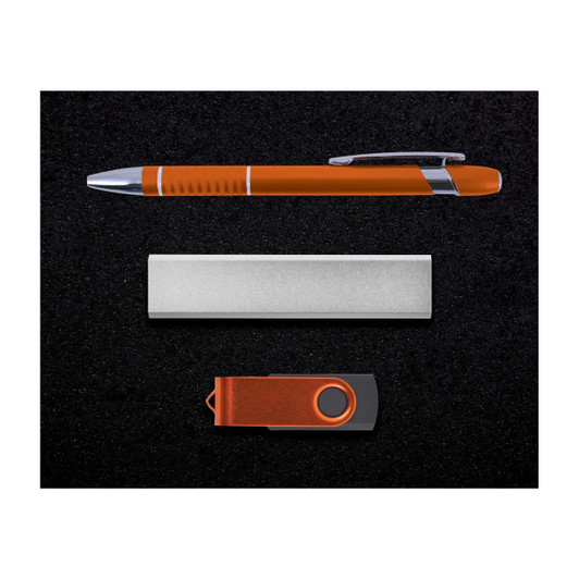 A gift set featuring an orange pen, a silver card holder, and an orange USB flash drive, all on a black background.