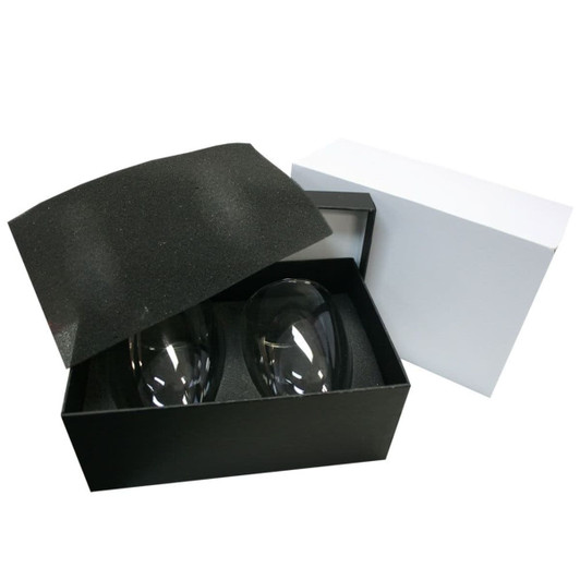 A glass coffee and tea set in a black box, featuring two transparent glasses. Includes a white outer box.
