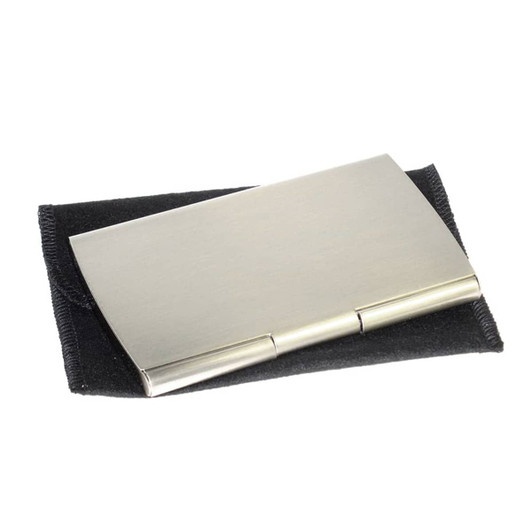 A sleek silver metal business card holder on a black velvet pouch, featuring a minimalist design and a logo.
