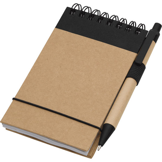 A recycled brown notebook with a black pen attached, featuring wire binding and an elastic band closure.