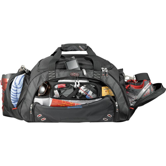 A black duffel bag with various items visible inside, including a towel, shoes, and personal accessories.