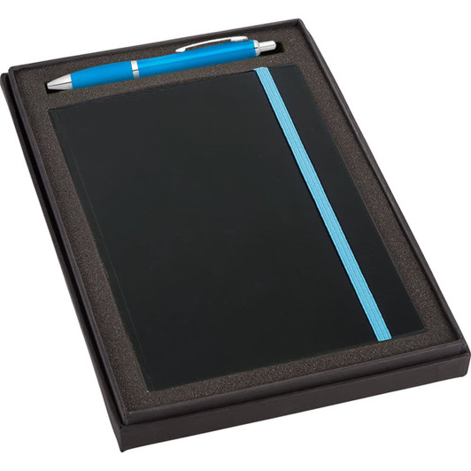 A black gift set containing a JB1001 journal with a blue elastic band and a blue Nash pen, presented in a box.