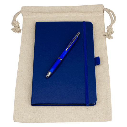 A drawstring bag in cream holds a blue journal book with a matching blue pen on top.