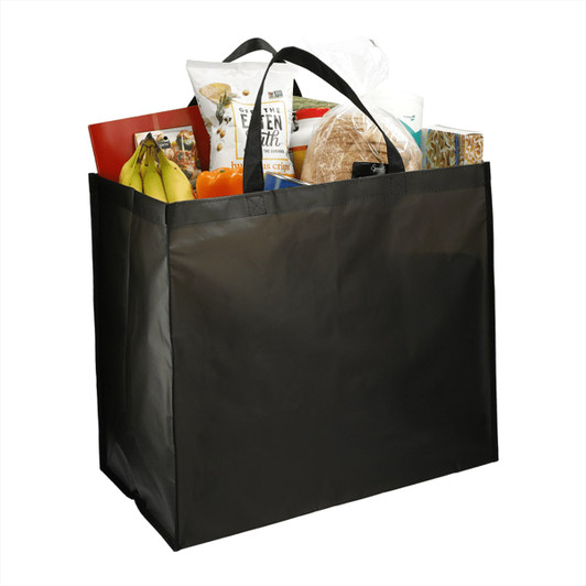 A black double laminated tote bag filled with groceries, including fruit, bread, and snacks. It features two handles.