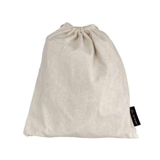 A cream-coloured drawstring bag made of fabric, featuring a small branding label on the side.
