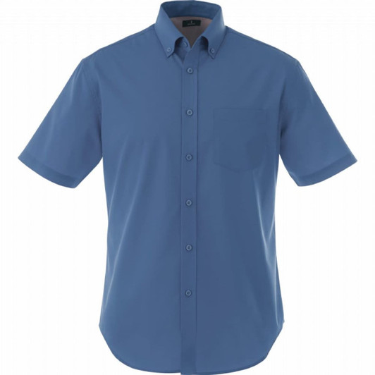 A short sleeve button-up shirt in blue with a chest pocket and a logo on the label.