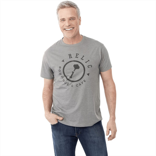A grey short sleeve tee featuring a logo on the front, worn by a smiling man.