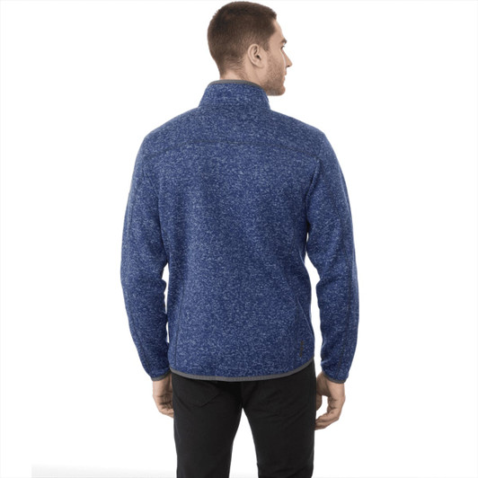 A men's knit jacket in a dark blue colour, featuring a high collar and a logo on the back.