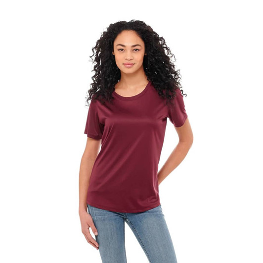 A maroon short sleeve tech tee for women, featuring a smooth fabric and a standard fit, with a logo present.