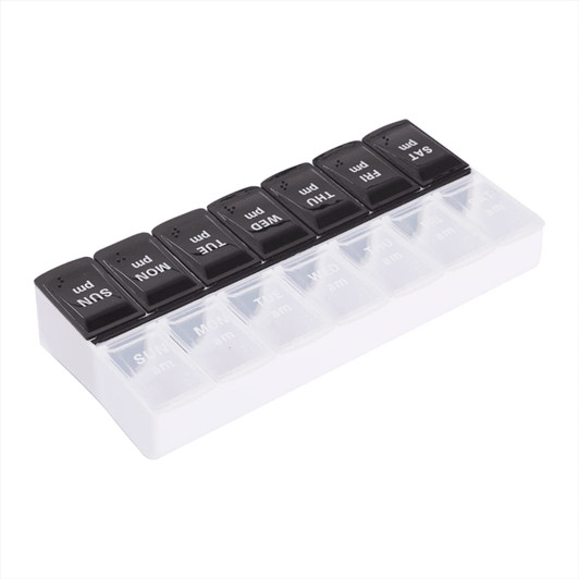 A black and white recycled AM/PM pill case with a transparent base and labelled compartments for each day.