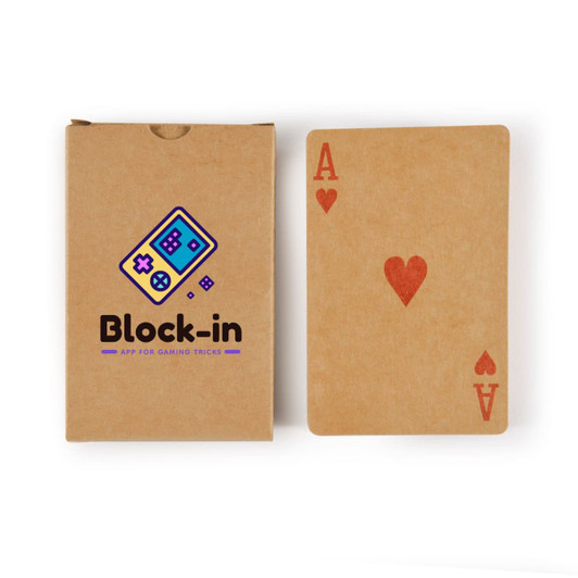 A deck of playing cards in a brown cardboard box featuring a heart Ace card. The box has a logo.