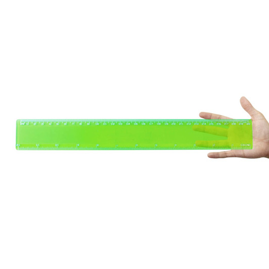 A transparent green 30cm ruler held in a hand, featuring both metric and imperial measurements.