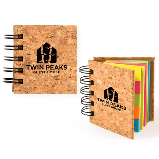 A cork sticky notes book with colorful sticky notes inside, featuring a logo on the cover.