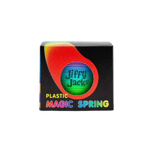 A plastic magic spring in vibrant rainbow colours, packaged in a black box with a logo on the front.