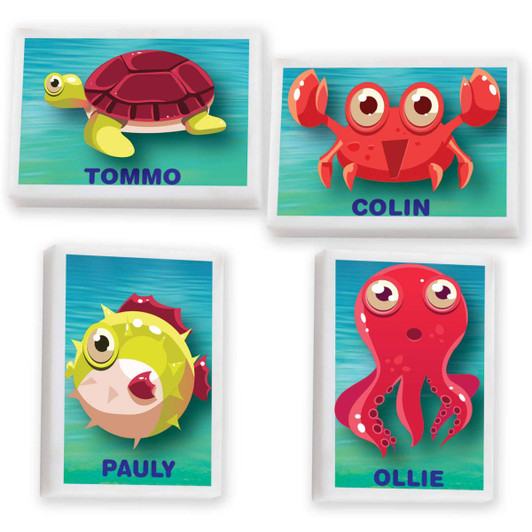 A set of four colorful cartoon sea creature erasers: a turtle, a crab, a pufferfish, and an octopus, each with a white border.