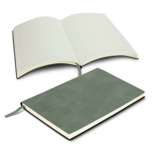 A soft cover notebook in green, open to reveal lined pages and a ribbon bookmark. Branding is present on the cover.