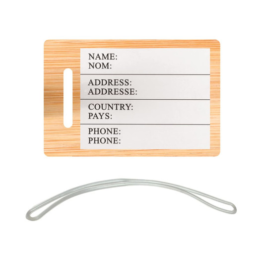 A bamboo luggage tag featuring a blank white area for personal information and a clear attachment loop.