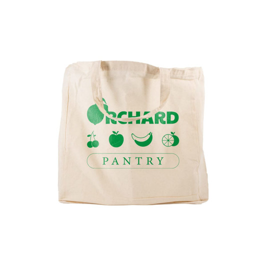 A beige reusable grocery bag with short handles and green branding. Features fruit designs and a logo.