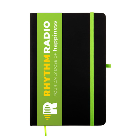 A black A5 notebook with a green and white branded sleeve and a matching green elastic band closure.