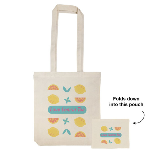 An off-white tote bag with a fruit design and a logo. It folds into a small pouch for easy storage.