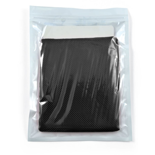 A black cooling towel packaged in a transparent pouch.