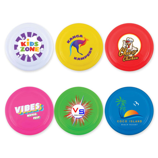 A set of colorful frisbees in white, yellow, red, blue, and green, each featuring different logos and designs.