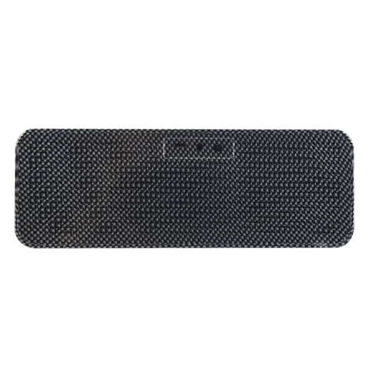 A black speaker and inductive charger with a textured surface, featuring a logo and multiple ports.
