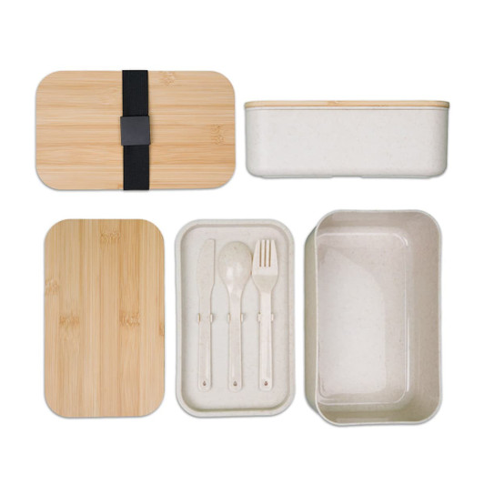 A bamboo-lid lunch box with a white container, featuring a fork, knife, and spoon inside. It has a logo.