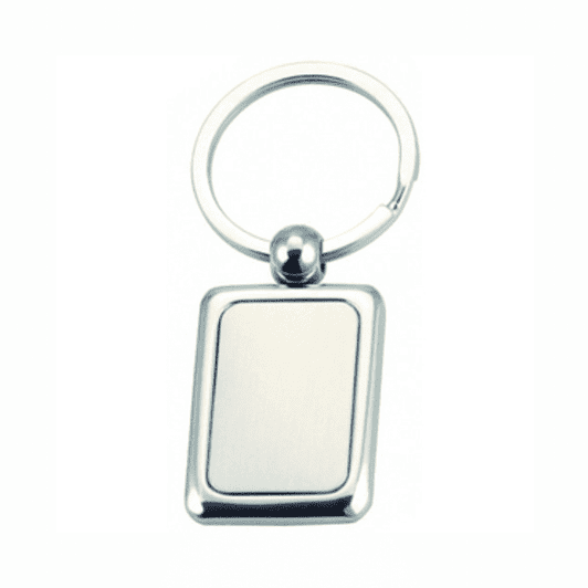 A metal keyring with a rectangular pendant, featuring a shiny silver finish. The pendant is blank and has a rounded attachment.