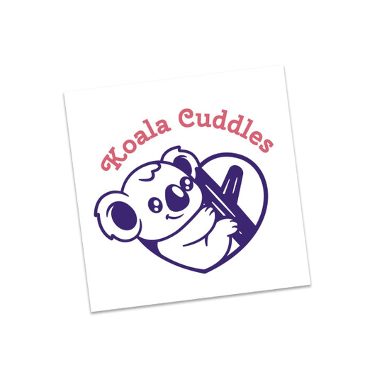 A square temporary tattoo featuring a cartoon koala holding a pencil inside a heart, with the text "Koala Cuddles".