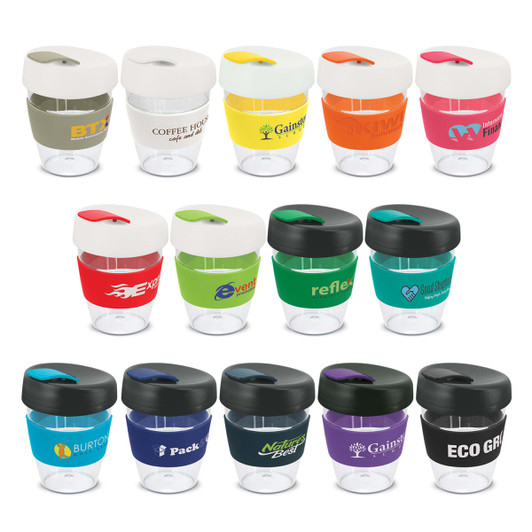 A collection of reusable coffee cups in various colours, featuring different designs and a logo on each.