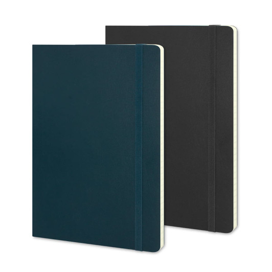 A large Moleskine Classic Soft Cover Notebook in dark green and black, featuring a spine and elastic closure.