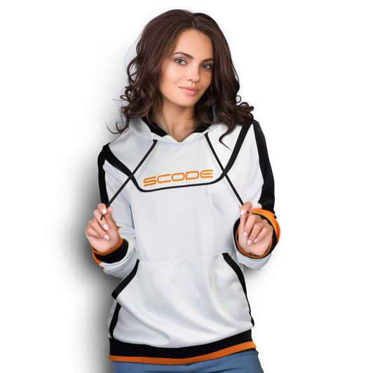 A woman wearing a white sports hoodie with black and orange accents, featuring a logo on the front.