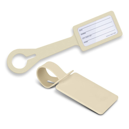 A beige silicone luggage tag featuring a blank information card and a circular attachment loop.
