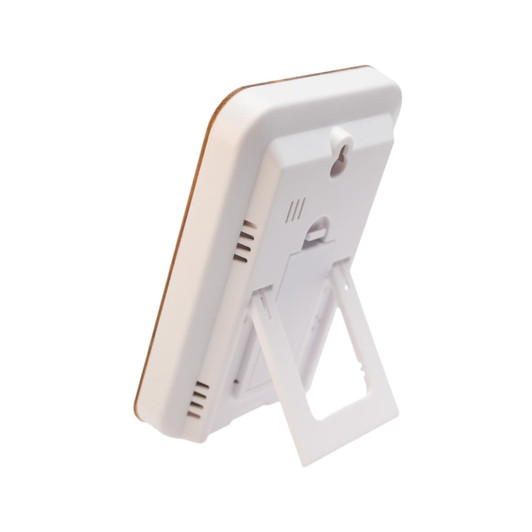 A weather station device with a sleek white design and a foldable stand for easy placement.