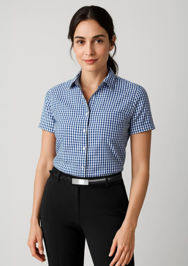 A short sleeve women's button-up shirt in blue and white gingham pattern, featuring a collar and buttons.