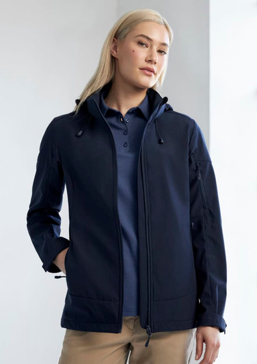 A navy women's jacket featuring a hood and multiple zippered pockets, with a branding logo visible.