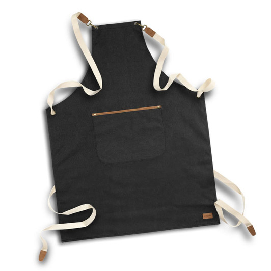 A black canvas apron with cream-coloured straps and a pocket at the front. Features a logo on the bottom corner.