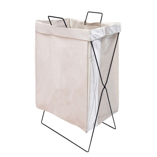 A cotton laundry basket with a beige fabric body and a black metal frame, featuring two handles on top.