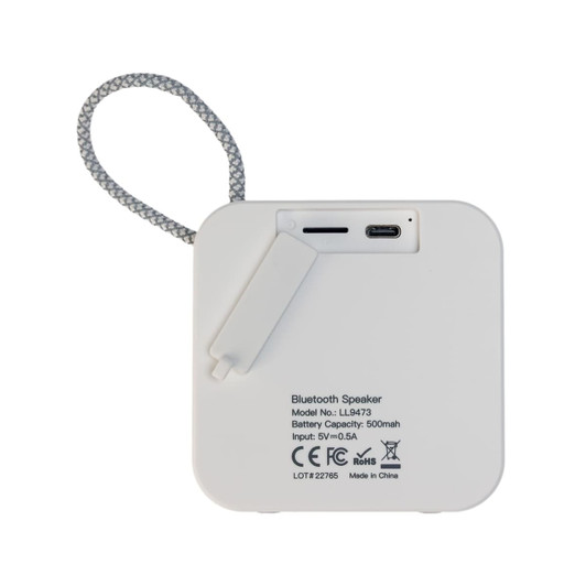 A white Bluetooth speaker featuring a looped strap, USB-C port, and branding on the back.