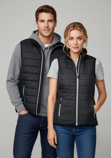 A black puffer vest with a zip, featuring two models wearing it over casual clothing, one style for men and one for women.