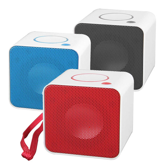 Three square Bluetooth speakers in blue, red, and grey, featuring a white casing and a strap.