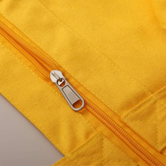 A zippered pouch in vibrant yellow fabric featuring a smooth metal zipper. The texture is clearly visible.