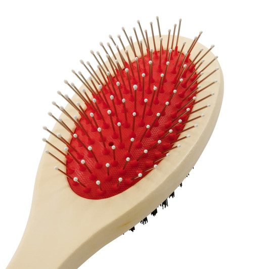 A pet grooming brush with a red bristle pad and white plastic handle, featuring a logo on the side.