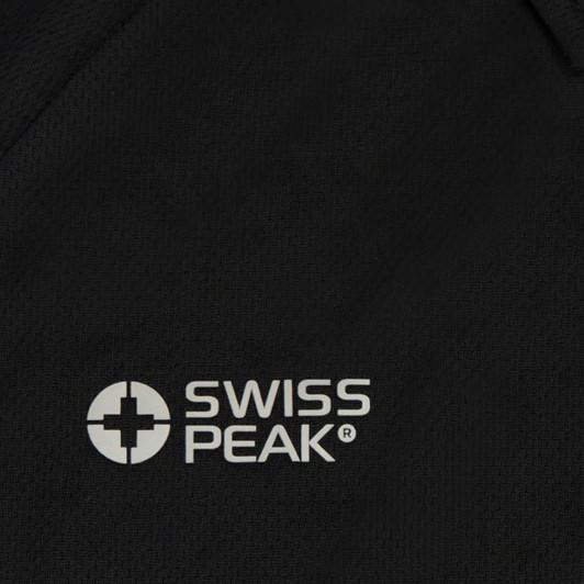 A close-up of a black polo shirt featuring a logo on the left side.