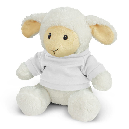 A soft cream-coloured lamb plush toy wearing a white top, with floppy ears and a friendly expression.