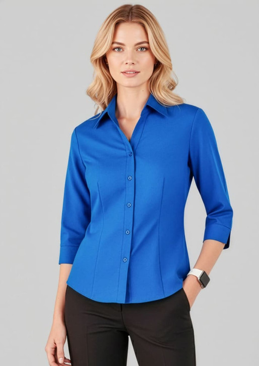 A blue, three-quarter sleeve shirt with a collared neckline, featuring a button-down front and a fitted silhouette.