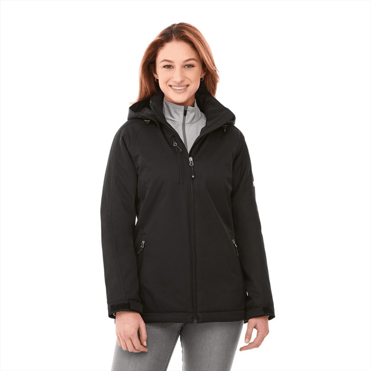 A women’s softshell jacket in black with a hood, featuring a zip front and two side pockets. It has a logo.
