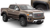 BUSHWACKER 40971-02 BLACK POCKET/RIVET STYLE SMOOTH FINISH 4-PIECE FENDER FLARE SET FOR 2015-2021 GMC CANYON W/61.7 INCH BED